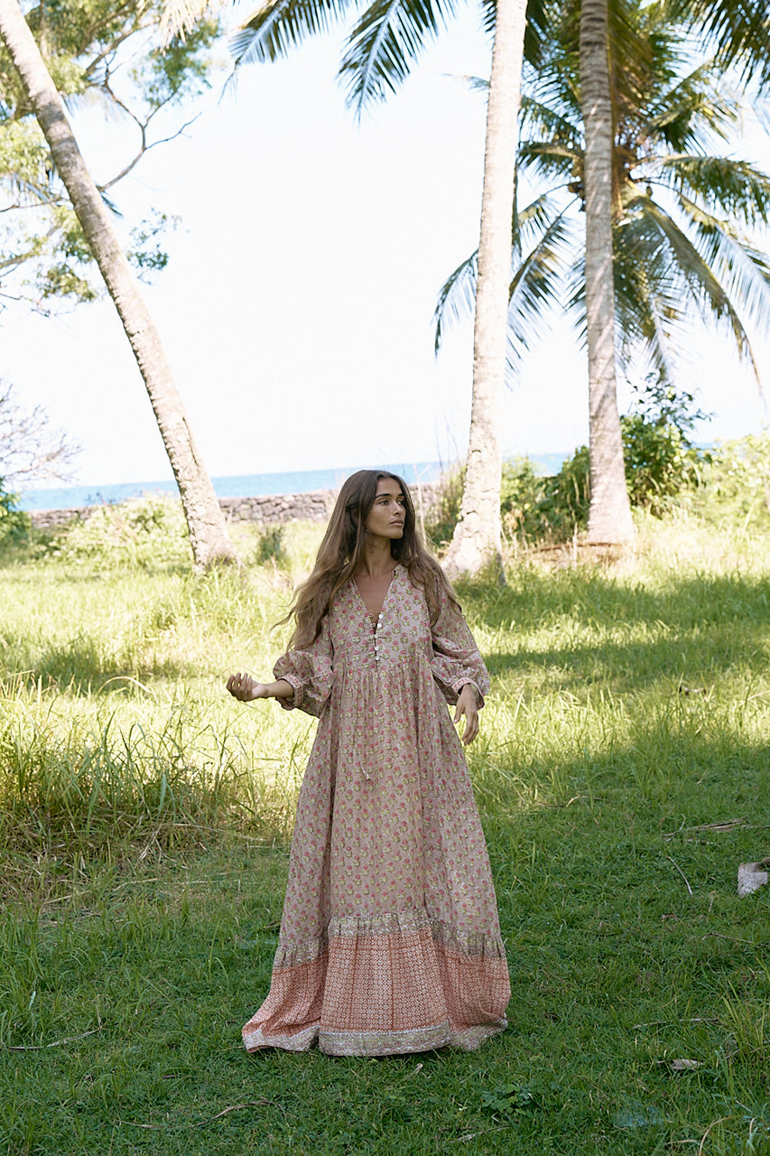 Bhoomi Maxi Dress Sunset — full silhouette among palm trees, hand block print ethical cotton | Daughters of India