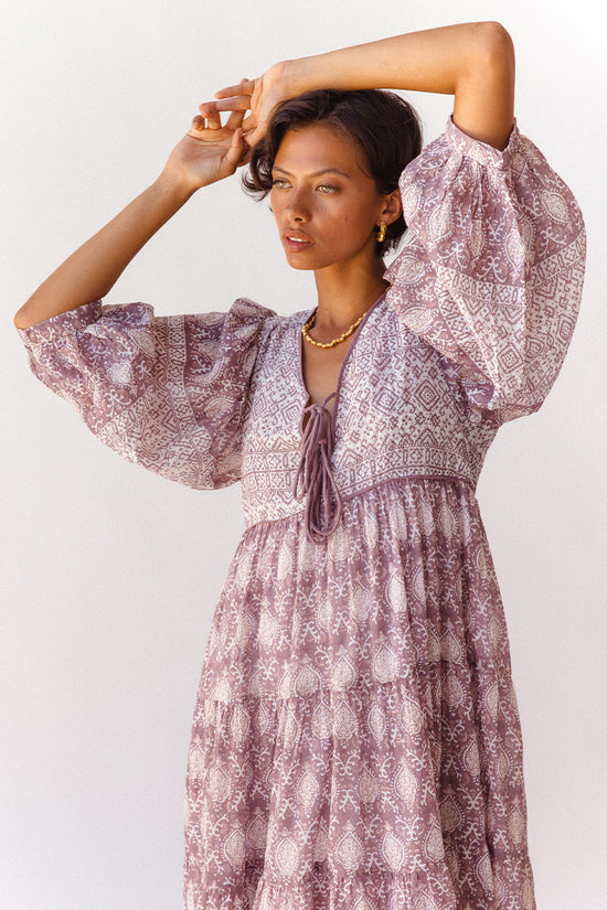 Jasmine Maxi Dress Lavender — studio model arm raised, upper body portrait, billowed sleeves and tie-front yoke, hand block print lavender cotton maxi, Sanganer Jaipur artisan made | Daughters of India