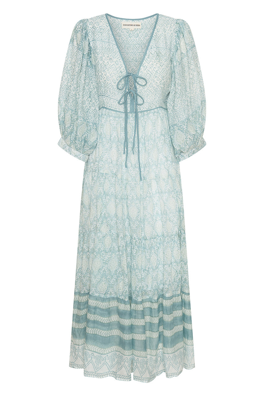 Jasmine Maxi Dress Sea Mist — ghost flat lay on white, full silhouette showing V-neckline tie yoke, tiered skirt with stripe hem, hand block print sea mist blue cotton, Jaipur artisan maxi | Daughters of India