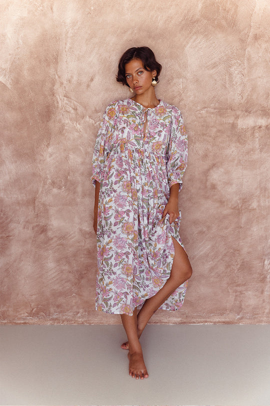 Daughters of India Kyra Midi Dress in Fuchsia Bloom — full length by terracotta wall, hand screen print cotton