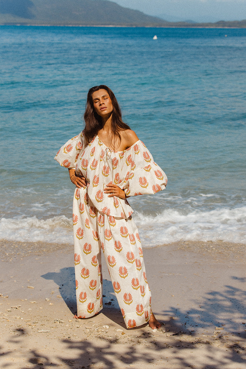 Ria Blouse Strawberry Cream — studio full length front view, model wearing strawberry cream hand block print cotton blouse, relaxed tie-front style, artisan Jaipur India | Daughters of India